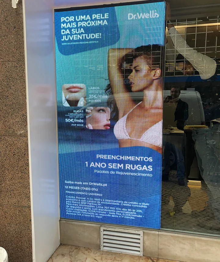 Ecrã publicitário Dr Wells